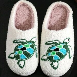 Cozy White Slippers with Turtle Design